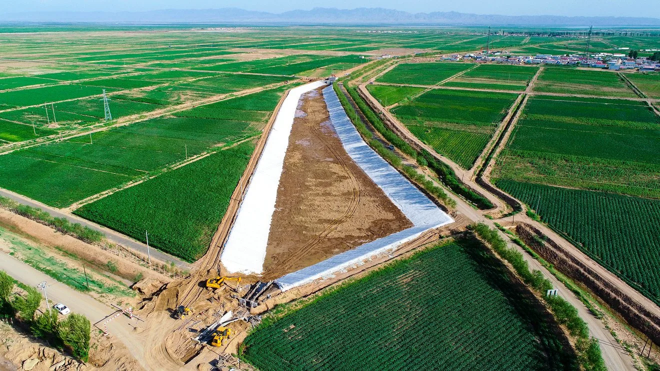 Aerial: canal lining under construction