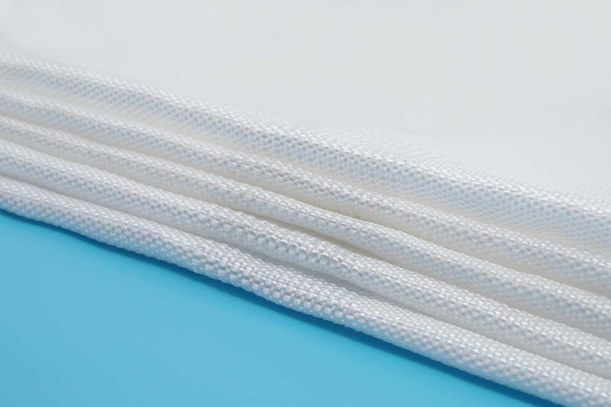 Filter point fabric weave detail with drainage openings